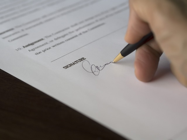 Person signing an agreement