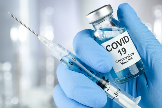 COVID vaccination syringe and vial 