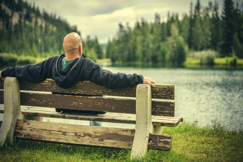 Renal patient relaxing by water