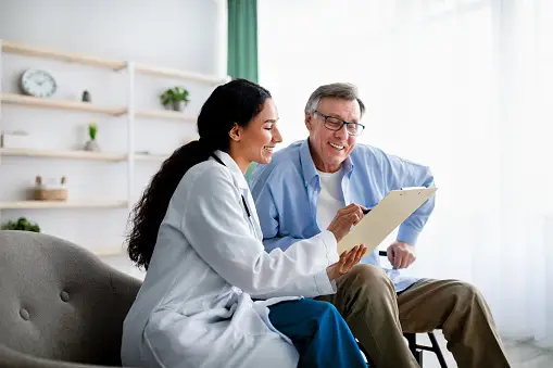 Doctor educating a patient 