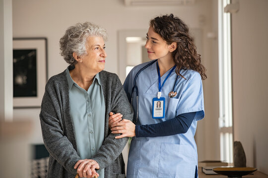 Medical professional helping a patient